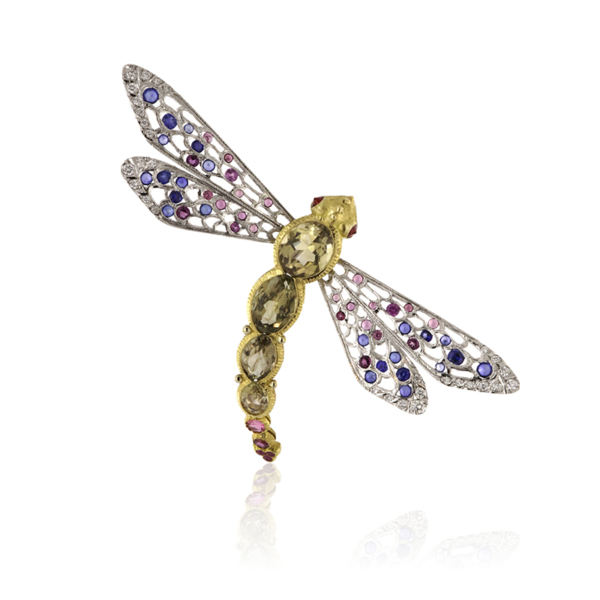 Libellula dalle ali in oro bianco, simbolo di leggerezza ed eleganza.