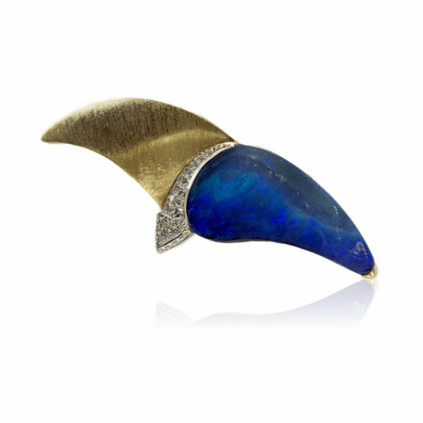 Spilla in oro giallo e bianco, un gioiello raffinato ed elegante.